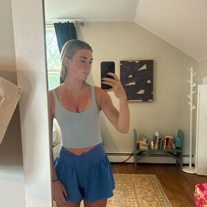 Light Blue Tank Top and Blue Shorts